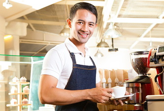 Barista making coffee
